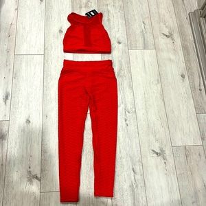 Red two piece semi sheer fineness fit.